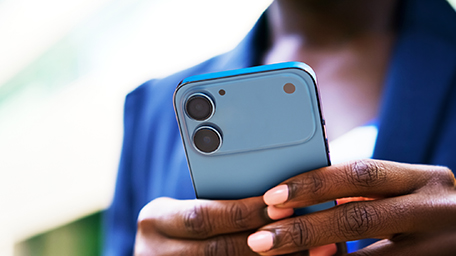 Women watching portal demo on phone